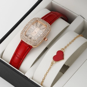 Luxury red leather watch set with crystal bezel and matching gold heart bracelet in gift box