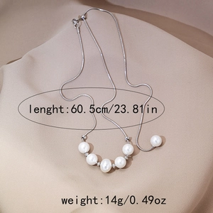 Detail of silver snake chain pearl necklace showing 60.5cm length and 14g weight info