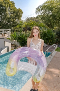 U-shaped inflatable lounge pool float with colorful glitter, handles and cup holder