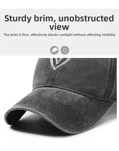 Close-up of heart embroidered washed denim baseball cap with sturdy brim and stitching