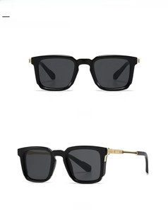 Front and 45-degree side views of black square sunglasses with gold metal accents