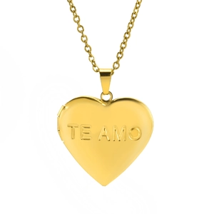 Golden heart locket necklace with TE AMO engraving on a polished metal surface