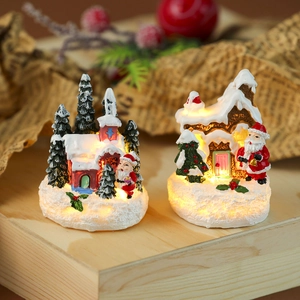 Light-up Christmas resin village house with Santa and pine tree festive decor
