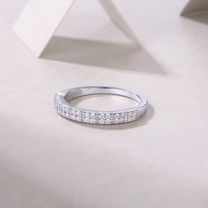 Macro shot of double row pavé setting on S925 sterling silver ring with cubic zirconia