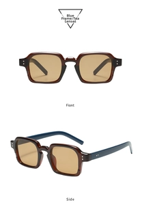 Detail view of square blue frame sunglasses with tea lenses and silver rivet accents