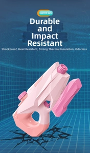 Detailed top view of pink water gun with geometric design and secure fill cap by a pool