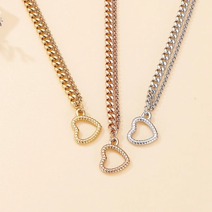 Double-layered titanium steel heart necklaces in gold, silver, and rose gold finishes