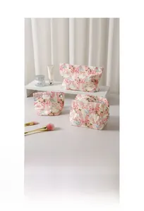 Detailed set of floral cotton cosmetic bags with pink bow and rose patterns