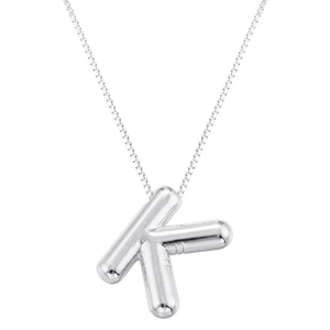 Macro view of silver 3D balloon K letter pendant on minimalist box chain necklace