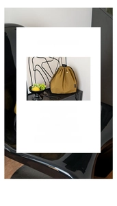 Detail of mustard yellow lunch bag showing insulated aluminum foil lining for thermal heat