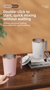 Close-up of white and pink automatic mixing cups on a wooden desk with coffee beans