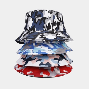 Vertical stack of four camo bucket hats in grey, light blue, pink and red camouflage patterns