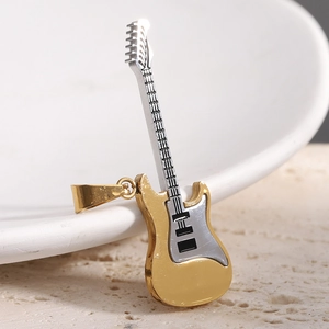 Close-up of a two-tone gold and silver guitar pendant made of durable stainless steel