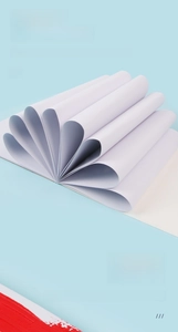 Close-up of thick professional acrylic painting paper showing rich texture and 12 sheets
