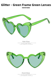 Close-up of heart-shaped sunglasses featuring glittery green frames and green lenses