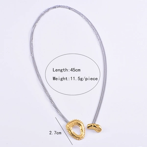 Detail showing mixed-metal necklace specifications with silver chain and gold pendant