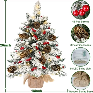 26-inch flocked tabletop Christmas tree with 60 LEDs, pine cones, and burlap base