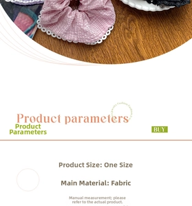 Detailed view of pink plaid scrunchie featuring white lace trim and rustic fabric texture