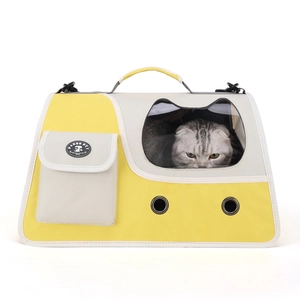 Portable pet carrier backpack in yellow and beige canvas with clear cat window