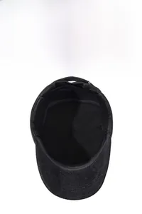 Close-up of thick thermal lining and durable stitching inside the men's winter flat cap