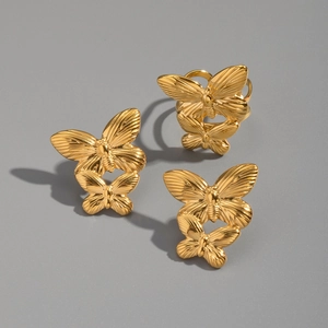Detailed view of three-piece 18K gold plated butterfly ring and earrings jewelry set