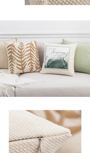 Detail showing invisible zipper and leaf embroidery texture on modern beige throw pillows