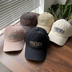 Detailed embroidery of Friends and New York Girl Crew on colorful cotton baseball caps