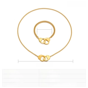 Detail of gold stainless steel jewelry set with handcuff pendant and chain specs