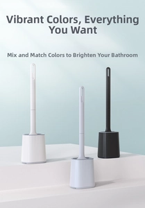 Three minimalist TPR toilet brushes in white, blue, and black with ribbed base stands