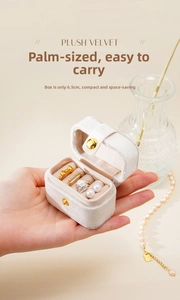 Mini plush velvet jewelry box detail showing 6.5cm compact size for rings and earrings