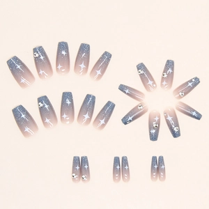 Blue gradient glitter false nails with rhinestones and star patterns in long coffin shape