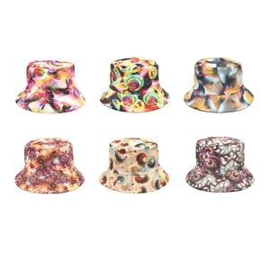 Collection of vibrant summer bucket hats with colorful digital prints and patterns