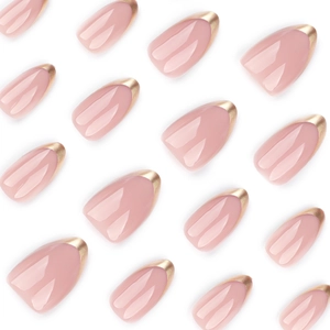 Almond press on nails in nude pink with metallic gold French tips on white background