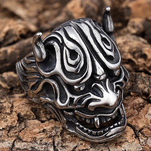 Macro shot of punk gothic Prajna demon mask ring with vintage oxidized silver finish