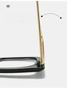Detailed close-up of reinforced metal hinges and gold temples on black cat-eye glasses