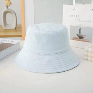 Close-up of light blue cotton bucket hat featuring detailed stitching and wide brim