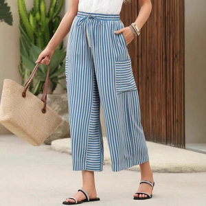 Women's vertical blue and white striped wide-leg pants with elastic drawstring waist