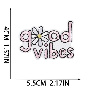 Embroidered 'good vibes' patch with white daisies for bag and clothing decoration