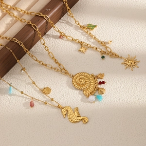 Golden stainless steel beach necklace with sea shell, seahorse and cactus pendants