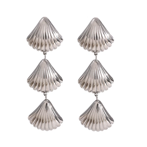 Polished silver stainless steel drop earrings featuring three tiered seashell charms