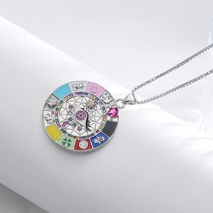 Bohemian silver coin necklace with lucky charms and colorful evil eye enamel pendant