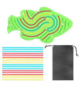 Detail of green fish-shaped sensory activity board with colorful silicone sticks and bag