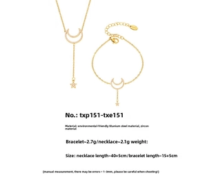 Detail showing moon and star titanium steel jewelry set with sparkling zircon tassels