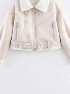 Detail view of cream moto jacket with faux shearling lining and metal zipper accents