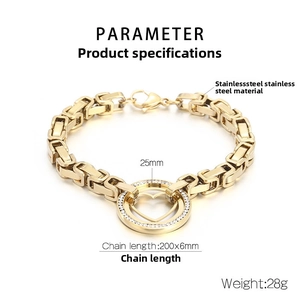 Macro detail of gold stainless steel chunky chain with paved heart pendant specs
