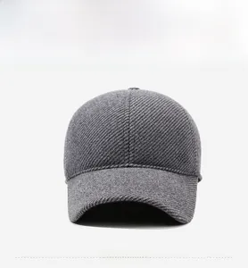 Detailed front view of dark grey winter baseball cap featuring knit texture and SPORT label