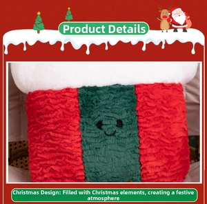 Detail of plush Christmas pillow with green embroidered face and soft texture