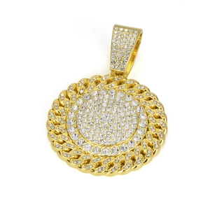 Close-up of a gold-plated circular pendant with micro-pave crystals and twisted border