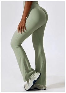 Rear view detail of high-waisted olive flare yoga pants with scrunch butt lifting effect