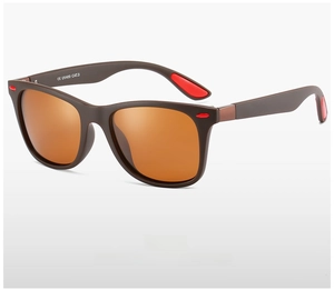 Detail of matte brown polarized sunglasses featuring orange gold lenses and red rubber accents